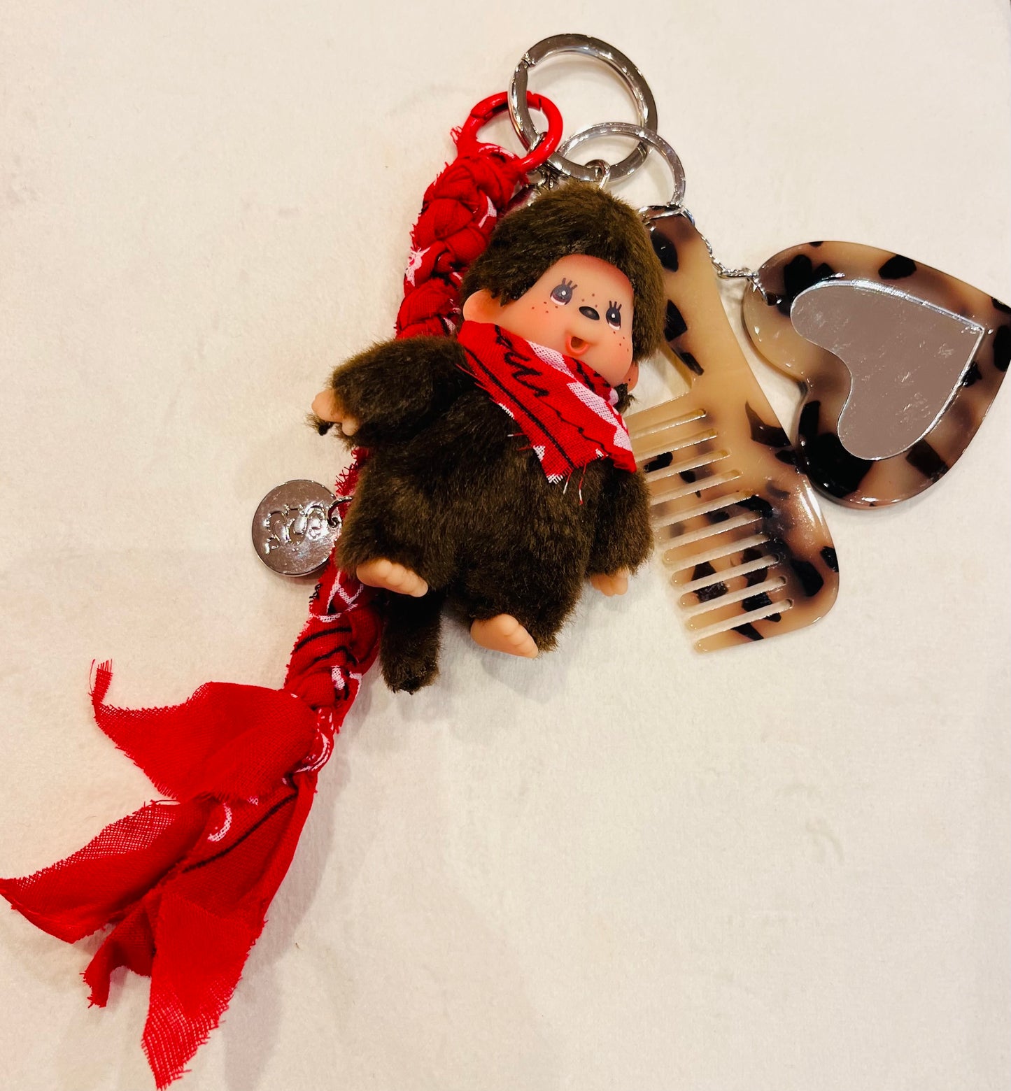 Bijou de sac Kiki Bandana- Le grigri iconique ultra mode